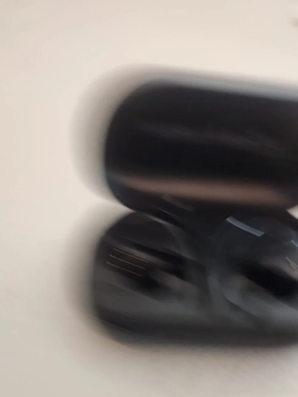 CHANEL Black Wireless Earbuds in Charging Case